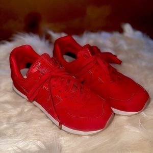 Red new balances.  Size 7.5. Worn maybe 3 times. Great condition.